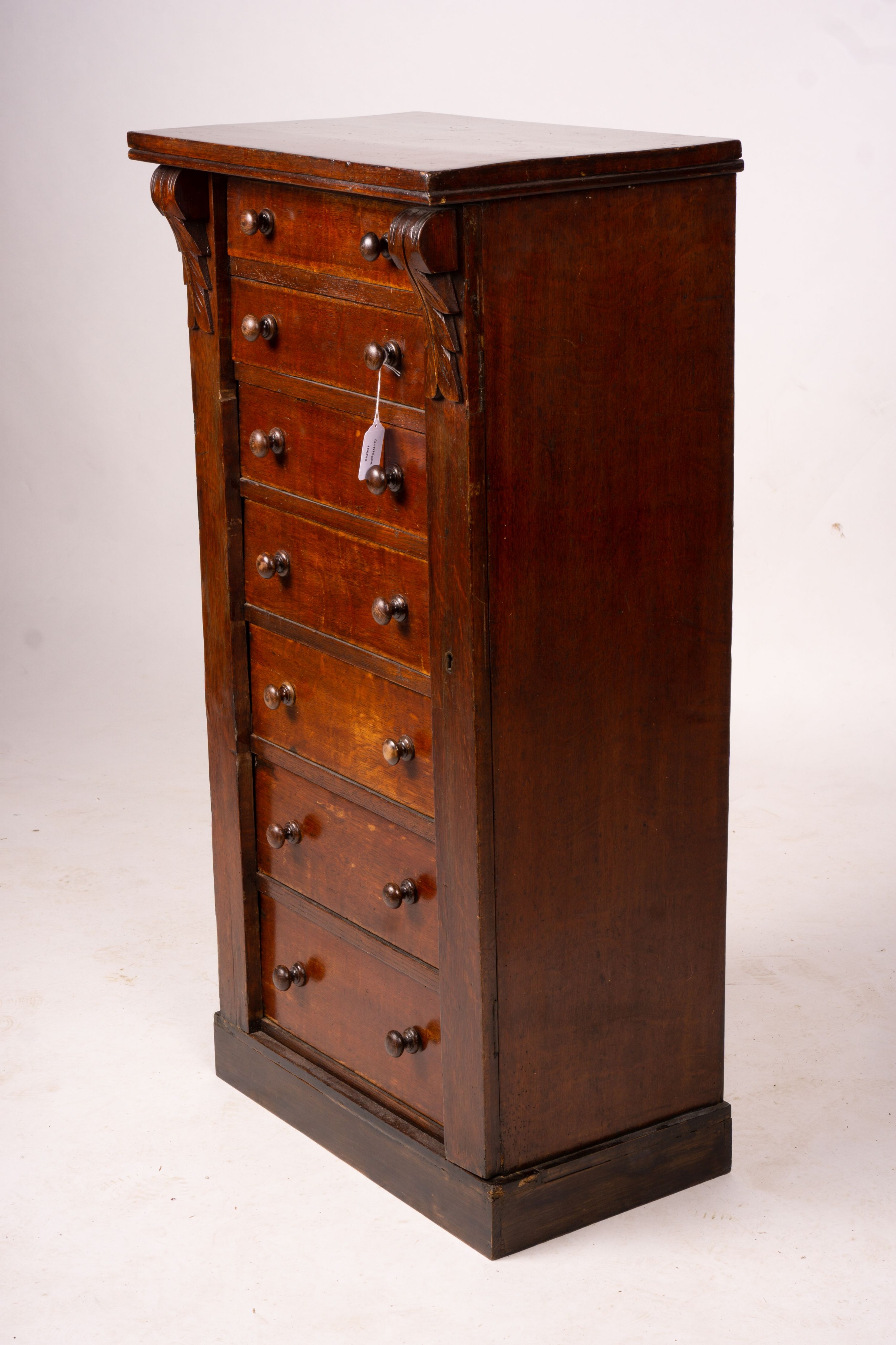 A late Victorian oak Wellington chest, width 51cm, depth 34cm, height 100cm